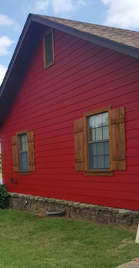 Red House Accent Colors, Red Log Cabin Exterior, Maroon Exterior House Paint, Red House Black Door, Red House With Brown Trim, Red Mobile Home Exterior, Red Ranch House Exterior, Red Exterior Paint Colors For House, Rustic Red Exterior House Colors