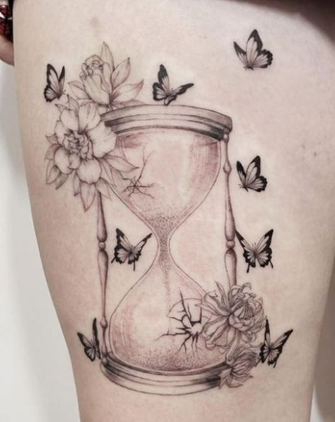 Hourglass Tattoo With Flowers, Hourglass Tattoo With Butterflies, Hourglass Leg Tattoo, Small Hour Glass Tattoos For Women, Bird Out Of Cage Tattoo, Sands Of Time Tattoo, Hour Glass Tattoo Ideas Unique, Hourglass Tattoos, Hour Glass Tattoos For Women