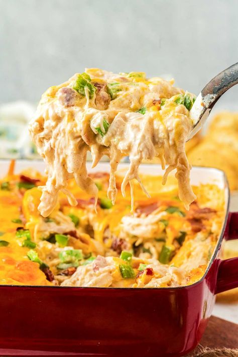 Jalapeno Popper Chicken Casserole! Have the best of both worlds with this quick and easy jalapeno popper chicken casserole, brimming with cheese, jalapenos, chicken, and a smooth, creamy sauce! | HomemadeHooplah.com Jalapeno Popper Chicken Casserole, Popper Chicken Casserole, Chicken Potato Casserole, Chicken Pasta Casserole, Frozen Chicken Recipes, Chicken Poppers, Popper Chicken, Chicken Dip Recipe, Jalapeno Popper Chicken