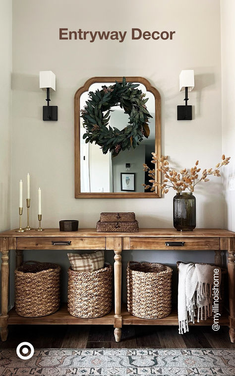 Maximize your entryway space with a small hallway table, curved mirror & decor that blends style and practicality. P.S. Use woven baskets that double as accents & organizers. Kos, Entry Way Table Decor Boho, Black Accent Wall Entryway, Entryway Table Decor With Mirror, Small Entry Way Ideas, Entry Nook, Curved Mirror, Entry Table Decor, Entryway Table Decor