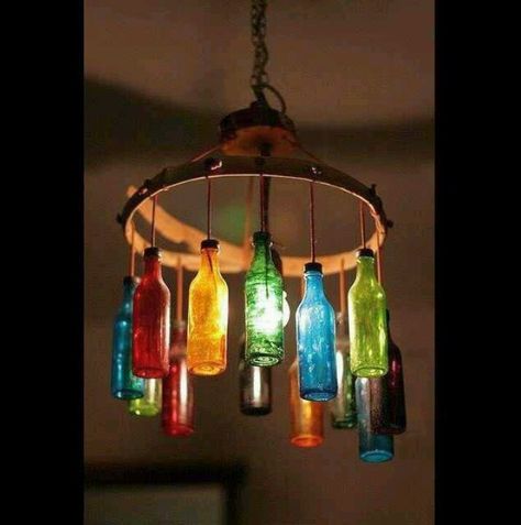 Colored glass bottle chandelier | Colored Glass | Pinterest Gazebo Lighting, Bottle Chandelier, Jar Chandelier, Recycled Bottle, Lighted Wine Bottles, Bottle Lights, Wine Bottle Crafts, Bottles And Jars, Bottle Art