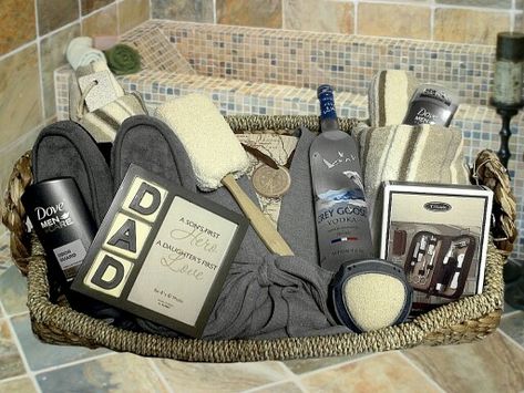 This gift basket consist of a large flat woven design wicker tray basket which includes the following items: *Two premium beige/grey/ivory blue stripe bath towels *A pair of grey color comfy men bath slippers * Grey waffle design spa bath robe *Travel Grooming Set (File/Scissors/Tweezers/Collapsible comb/Toenail clipper/Nail clipper/Multi-function knife/Battery-operated nose hair groomer with vintage leatherette zipper case) *Dove Men Odor Guard Body wash & deodorant *750ml bottle of Grey Goose Travel Gift Basket, Bath Slippers, Fathers Day Gift Basket, Tray Basket, Spa Basket, Waffle Design, Boyfriend Gift Basket, Baskets For Men, Gift Baskets For Men