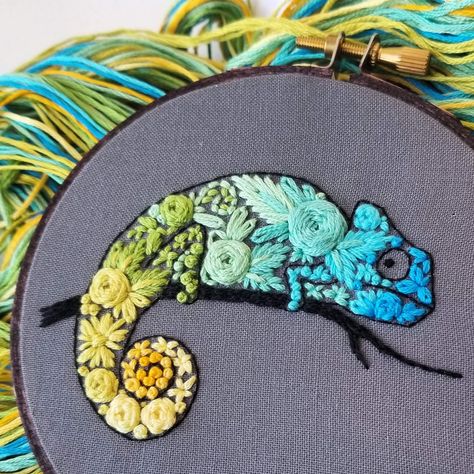 This colorful little project is beginner friendly and the finished hoop art is sure to cheer up your walls. Did you know that chameleons will change color in response to their mood, changes in temperature and even humidity? Your kit includes: Grey fabric permanently stamped with the design A 4 inch wooden hoop. Note my completed hoop art is framed in a wood hoop stained to look dark. Your hoop will be natural wood color. Hand embroidery needles A floss card with all 9 needed colors of DMC six-st Fabric Stamping, Hand Embroidery Kit, Hand Embroidery Projects, Needlepoint Designs, Animal Embroidery, Embroidery Supplies, 자수 디자인, Hand Embroidery Art, Hand Embroidery Stitches