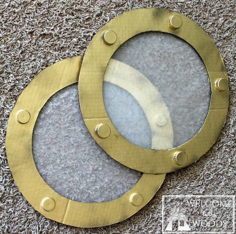 Cardboard Ship Wheel & Fake Portholes                                                                                                                                                                                 More Cardboard Pirate Ship Diy How To Make, Diy Porthole Window, Yacht Rock Party Decor, Cardboard Pirate Ship Diy, Cardboard Waves, Porthole Painting, Pirate Ships Diy, Cardboard Ship, Pirate Ship Wheel