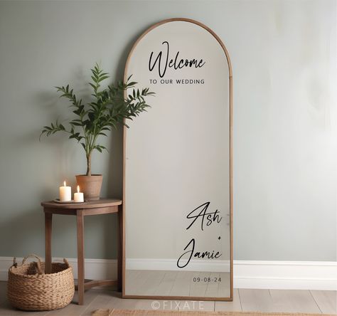 Custom Mirror Decal for Wedding Crafted from premium vinyl, our gorgeous decals offers a personalised touch for your special day. Tailored to showcase the names of the bride and groom, alongside the cherished wedding date, it adds a timeless elegance to any space. Effortlessly apply and remove this versatile decal, enhancing not only walls but also mirrors, acrylic boards, wooden boards, or chalkboards with equal finesse. DECAL PACKAGES See listing images for decal packages and sizes. All sizes Mirror Ideas For Wedding, Mirrored Wedding Signs, Welcome Wedding Signs Mirror, Round Wedding Mirror Sign, Weddings Mirror, Mirror Sign For Wedding, Welcome To Our Wedding Mirror Sign, Wedding Reception Mirror Sign, Large Mirror Wedding Sign