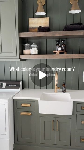 Erica Soutar on Instagram: "If you have to do laundry everyday for the rest of your life you might as well do it in a space you enjoy. 

The color of our laundry room is a custom color from the cabinetry company HOWEVER it is almost identical to SW Cast Iron! If you’re looking for the perfect green that’s not too light or too dark this is it my friends!! 
.
.
. 
#homebuild #homebuildtips #laundryroom #laundryroomgoals #laundryroomdesign #interiordesign #interiordecor" Popular Laundry Room Cabinet Colors, Colors For Laundry Room Cabinets, Evergreen Fog Cabinets Laundry Room, Utility Room Cabinet Colors, Light Green Laundry Room Cabinets, Olive Green Laundry Room Cabinets, Pink And Green Laundry Room, Laundry Room Colours, Green Cabinet Laundry Room