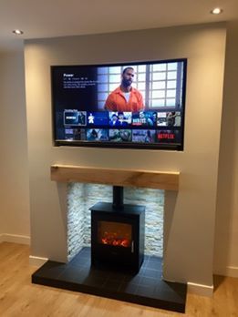 Not usually a fan of TV above fireplace, but in some cottages it’s the only place for it! Tv Wood Stove, Oak Beam Fireplace With Tv, Wood Stove Tv Above, Tv And Stove Wall Ideas, Log Burner Fireplace With Tv Above, Wood Burner And Tv Wall, Woodburner Tv Wall, Tv On Wall Above Log Burner, Tv Over Stove Fireplace Ideas