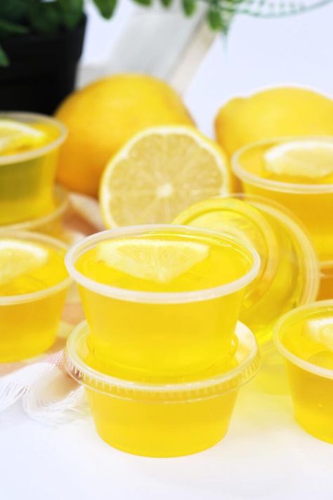 Lovely Lemon Drop Jello Shot Recipe | Lemon Drop Jello | Jello Shot Recipe | Vodka Jello Shot Recipes | Lemon Recipes #LemonDropJelloShotRecipe #LemonDropJello #JelloShotRecipe #VodkaJelloShotRecipes #Lemon Recipes Vodka Jello Shot Recipes, Lemon Drop Jello Shots, Lemon Jello Shots, Lemonade Jello Shots, Shots Alcohol Recipes, Lemon Drop Shots, Jello Shots Recipe, Jello Shot Cups, Drinks With Alcohol