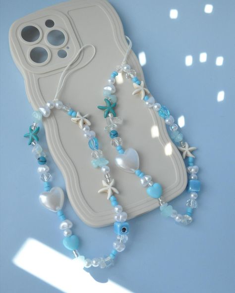 🌊✨ Elevate your style with our Aquamarine Ocean Inspired Phone Charm! Pearls, blue seed beads, and a touch of magic—perfect for your phone, bag, or keyring. 💙🌟 Ocean Phone Charm, Blue Phone Charm, Strap Phone, Ocean Inspired, Phone Strap, Ocean Inspiration, Phone Charm, Elevate Your Style, Phone Bag