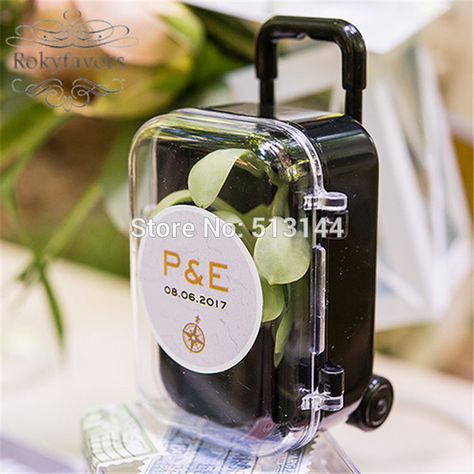 FREE SHIPPING 100PCS Clear Mini Rolling Travel Suitcase Favor Box Wedding Favors Party Reception Candy Package Baby Shower Ideas-in Gift Bags & Wrapping Supplies from Home & Garden on Aliexpress.com | Alibaba Group Wedding Party Favors Cheap, Wedding Favors For Men, Travel Theme Bridal Shower, Bon Voyage Party, Homemade Wedding Favors, Spring Wedding Favors, Creative Wedding Favors, Inexpensive Wedding Favors, Travel Theme Wedding