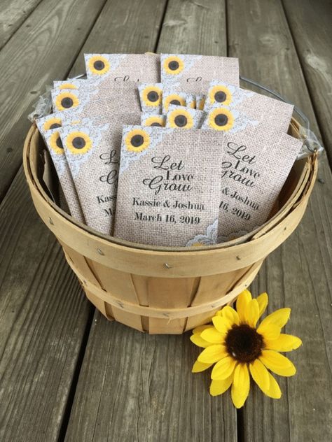 Seed Packet Wedding Favors - The Budget Bride | wedding planning | wedding ideas | wedding inspiration | budget weddings | DIY weddings | wedding favors ideas | ideas for wedding favors | affordable wedding favors | plant seeds | wedding guest gifts Wedding Seed Packet Favors, Sunflower Wedding Favors, Personalized Candy Wrappers, Custom Seed Packets, Sunflower Wedding Decorations, Seed Packets Favors, Sunflower Themed Wedding, Seed Wedding Favors, Personalized Candy