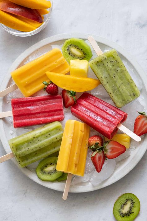 Learn how to make popsicles from scratch and try these three fruit popsicle flavors: strawberry, mango and kiwi. It's an easy healthy recipe that kids and adults will love! Easy Recipes | Kid Friendly Recipes | Fruit Recipe Ideas | Popsicle Recipes Feelgoodfoodie Recipes, Popsicle Flavors, Mango Popsicle Recipes, Kiwi Popsicles, Make Popsicles, Fruit Popsicle Recipes, Homemade Fruit Popsicles, Homemade Ice Pops, Healthy Popsicle Recipes