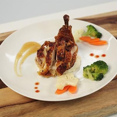 It can be hard plating classic favorites — like chicken, vegetables, and mashed potatoes with gravy — without re-creating that '70s TV dinne... Fine Dining Plating, Art Of Plating, Plating Food, 70s Tv, Gourmet Food Plating, Food Plating Techniques, Christmas Dinner Plates, Chicken Plating, Dessert Presentation