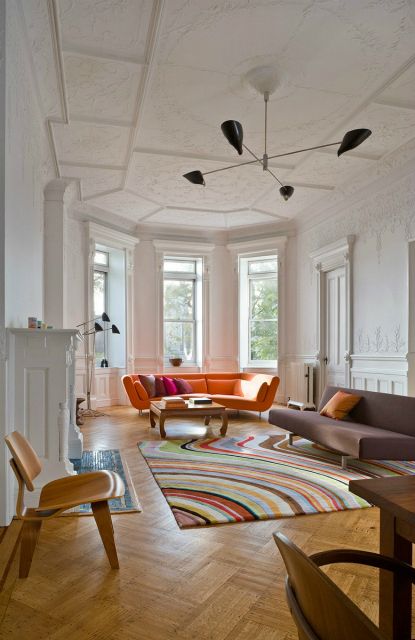 Columbia Heights Apartment:  living room, Leone Design Studio | Remodelista Architect / Designer Directory Orange Sofa Design, Living Room New York, Weave Rugs, Lots Of Windows, Mid Century Living, Mid Century Living Room, Living Room Design Ideas, Room Design Ideas, Contemporary Living Room