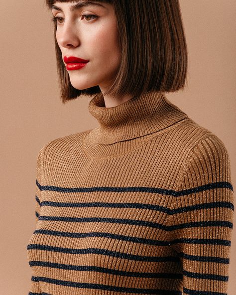 "The cut: LISAEL is a fine striped knit turtleneck sweater. Its rib knitting is in a yarn embellished with lurex. Its sleeves are long and its fitted cut.