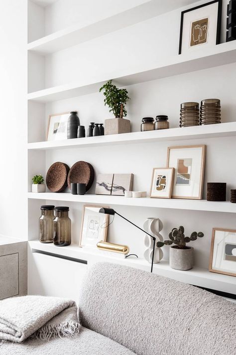 How To Make Your Shelves Look Like A Pinterest Board | Glamour UK High Wall Shelf Decorating Ideas, Wall Shelf Decorating Ideas, High Wall Shelf, Shelf Decorating, Shelf Decor Living Room, Wall Shelf Decor, Wall Shelves Design, White Shelves, Living Room Shelves