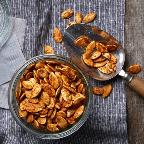 Salty, spicy and garlickly, these roasted pumpkin seeds are the perfect snack for any time of day. Increase the quantity of ground chile if you want 'em extra hot. Roasted Butternut Squash Seeds, Pumpkin Seed Recipes Roasted, Spicy Roasted Pumpkin Seeds, Fresh Pumpkin Recipes, Fall Routine, Spicy Pumpkin Seeds, Pumpkin Seeds Recipe, Thanksgiving Appetizers Easy, Peter Pumpkin