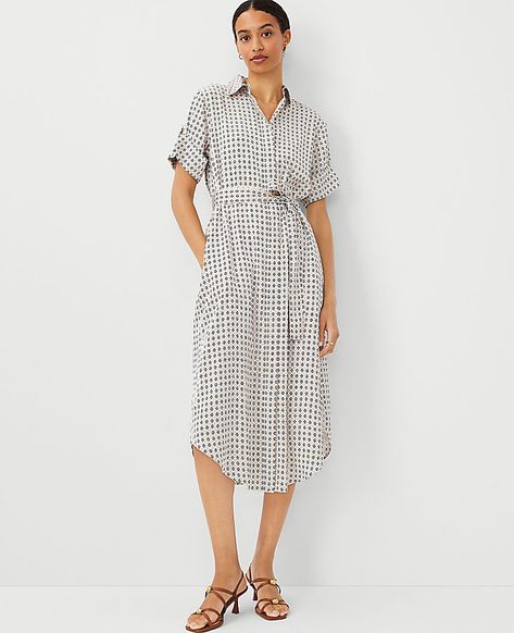 In a smart geo print, our collared shift dress is the answer to everyday ease. Point collar. Short sleeves with epaulettes. Hidden button front placket. Self tie belt. Back yoke with box pleat. Lined body.,Hit:Hits at mid-calf,Imported:Imported,Length:29" from natural waist,Fabrication:100% Polyester,Garment Care:Machine Washable Petite Geo Midi Shift Dress by Ann Taylor Size petite - 00 White Women's Shirtdress, Regular, Open, Front, Short, Sleeve, Dresses, 100%, Polyester, Machine, Washable A Line Summer Dresses, Dresses For The Office, Older Women Dresses, Summer Work Dress, Sunday Dresses, Casual Knit Dress, Wardrobe Capsule, Midi Shift Dress, Professional Dresses