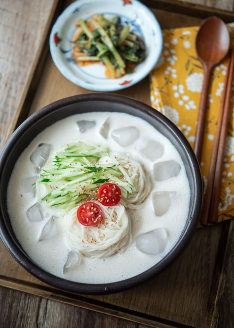 Enjoy a refreshing bowl of Kongguksu, a traditional Korean Cold Soy Milk Noodle Soup, without the typical hassle. This 10-minute recipe uses tofu and store-bought soy milk for an instantly ready soup base, delivering authentic flavor. All you need to do is cook the noodles! Sujebi Recipe, Korean Healthy Food, Milk Noodles, Korean Noodle Soup, Recipes Using Tofu, Cold Noodles Recipes, Noodles Dishes, Korean Cold Noodles, Korean Menu