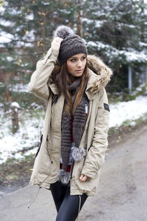 Rock a beige parka with black leather leggings to get a laid-back yet stylish look.   Shop this look on Lookastic: https://lookastic.com/women/looks/beige-parka-black-leggings-charcoal-beanie/23468   — Charcoal Knit Beanie  — Charcoal Knit Scarf  — Beige Parka  — Black Leather Leggings New York Winter Outfit, Parka Outfit, Chic Winter Coat, Outfit Boots, Winter Coat Outfits, Winter Outfits Warm, Hiking Outfit Women, Warm Clothes, Snow Outfit