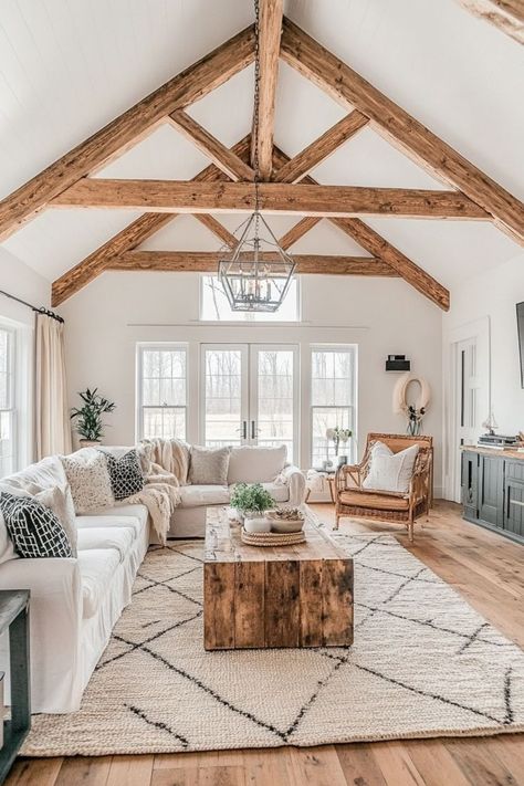 Enhance your home’s character with exposed wooden ceiling beams. Whether you’re going for a farmhouse look or a modern rustic vibe, wooden beams add depth and style. 🏠✨🌲 #WoodenBeams #CeilingDesign #HomeDecor #RusticCharm Spanish Farmhouse Living Room, Wooden Ceiling Beams, Ceiling Beams Living Room, Modern Cottage Homes, Farmhouse Lifestyle, Farmhouse Cozy, Farmhouse Living Rooms, Beams Living Room, Farmhouse Family Rooms