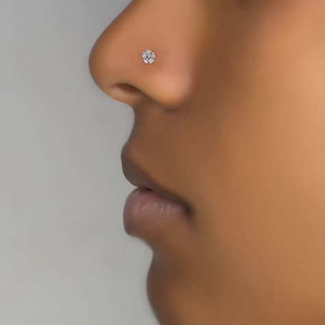 Beautiful tiny flower nose stud for pierced nose. Tribal, unique, ethnic, delicate design with high quality materials. Material options : Sterling silver 925 / 14k Gold plated on Sterling silver base (Use scrollbar to choose your material ) Diameter: 0.2 Inch - 5 mm Wire thickness: 0.8 mm - 20g *Nickel-free For more nose rings- https://www.etsy.com/shop/Umanativedesign?section_id=16881369&ref=shopsection_leftnav_6 We offer a range of septum rings, for pierced and non- pierced noses, made of Small Nose Studs, Flower Nose Stud, Unique Nose Rings, Tiny Nose Studs, Tiny Nose, Nose Piercing Stud, Small Nose, Gold Nose Stud, Dainty Style