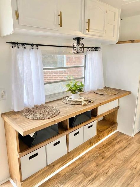 Small Camper Couch Ideas, Rear Kitchen Camper Remodel, Minimalist Camper Interior, Boho Rv Kitchen, 32 Ft Camper Remodel, Camper Renovation Storage, Table For Rv, Small Camper Makeover Interior, Small Rv Remodel Ideas