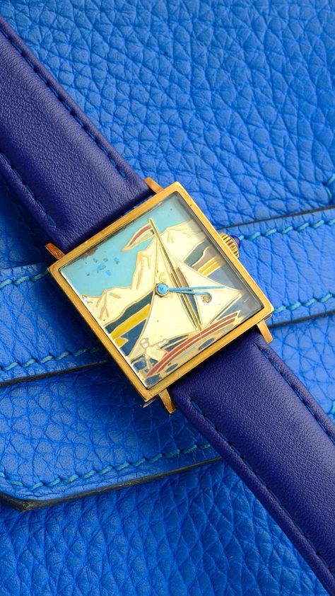 A yellow gold 'Sailing dial' wrist watch. Cool Watches Unique, Fun Watches, Unique Wrist Watch, Funky Watches, Vintage Wrist Watch, Unique Watches, Gold Watches, Vintage Timepiece, Retro Watches