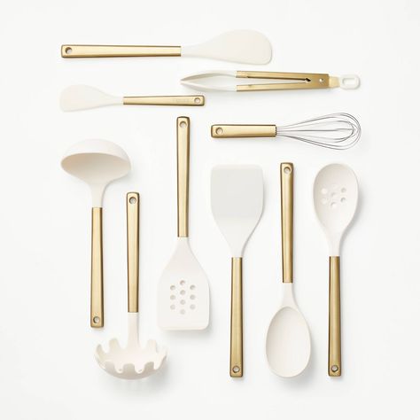 This 10-Piece Stainless Steel/Nylon Kitchen Utensil Set from Figmint™ gives you everything you need to take on just about any recipe. The 10-piece set includes a solid turner, slotted turner, solid spoon, slotted spoon, ladle, pasta server, spatula, whisk, tongs and a mini spatula, all of which are dishwasher safe and resist heat up to 450 degrees. Nylon and silicone heads are safe to use on any cooking surface, and the ergonomic stainless steel handles are designed with you in mind. Best of all Gold Kitchen Accessories, Pasta Server, Slotted Spoon, Gold Kitchen, Kitchen Utensil Set, Spatulas, Kitchen Utensil, Space Saving Storage, Utensil Set