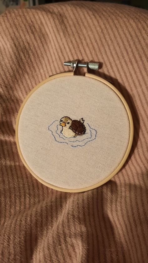 on the picture you can see an embroidery of a turtleduck from Avatar the last Airbender. Studio Gibhili Embroidery, Embroidery Aesthetic Designs, Embroidery Duck Simple, Studio Ghibli Embroidery Simple, Turtleduck Avatar, Avatar The Last Airbender Embroidery, Embroidery Avatar, Atla Embroidery, Embroidery Ducks