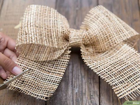 3 Ways to Make a Burlap Bow - wikiHow Burlap Ribbon Bow, Easiest Burlap, Chair Bows, Diy Burlap, Burlap Bow, Burlap Bows, Wooden Gift Boxes, Burlap Ribbon, Bow Flats