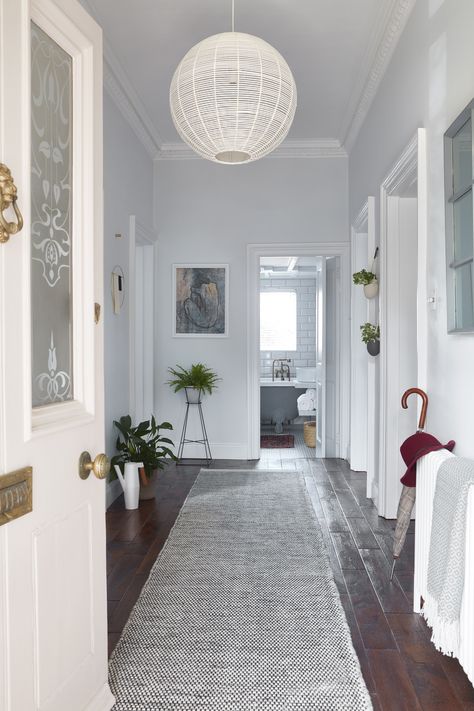 Hardwood floors look gorgeous in a hallway, but they do start to show dust and dirt around doorways quite quickly. So using a hallway rug to protect your floors from too much wear and tear makes sense. #hallway #woodflooring #realhomes Hallway Runners Ideas Hardwood, Rug In Hallway, Hallway Rugs Ideas, Hallway Runners Ideas, Hallway Colour Schemes, Entry Way Runner Rug, Dark Wooden Floor, Hallway Paint, Hallway Colours