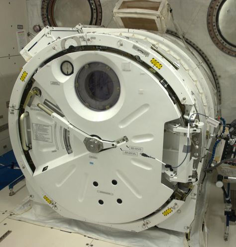 Like a torpedo tube, this airlock in the Japanese Lab allows us to put experiments out into the vacuum of space. Scifi Door, Machine Reference, Mechanical Joints, Maple Town, Scifi Interior, Chris Hadfield, Spaceship Interior, Hard Surface Modeling, Sci Fi Design