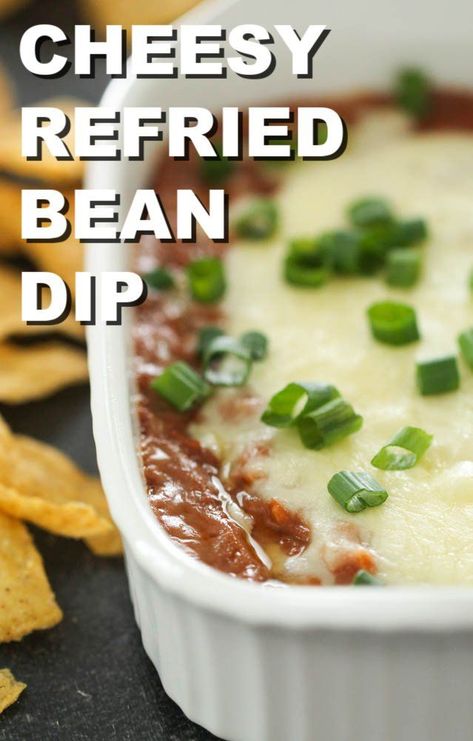 This Cheesy Refried Bean Dip is so easy to throw together and makes a delicious appetizer or party food. With onion, garlic, refried beans, cream cheese and shredded cheese, you can't go wrong! Serve this Mexican-inspired dip with tortilla chips for the ultimate snack on game day. Bean Dip Recipes Refried, Bean Bake, Refried Bean Dip, Bbq Foods, Bean Dip Recipe, Refried Bean, Bean Dip Recipes, Bean Snacks, Mexican Appetizers