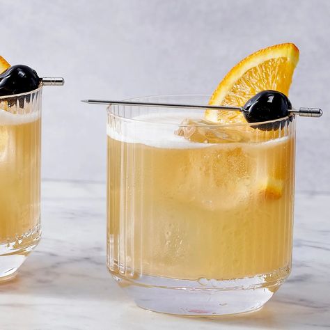 Whiskey Sour Recipe | Bon Appétit Whisky Sour Recipe, Best Bourbon Whiskey, Whiskey Sour Recipe, Whisky Sour, Sour Foods, Lemon Twist, Orange Wedges, Sour Cocktail, Good Whiskey