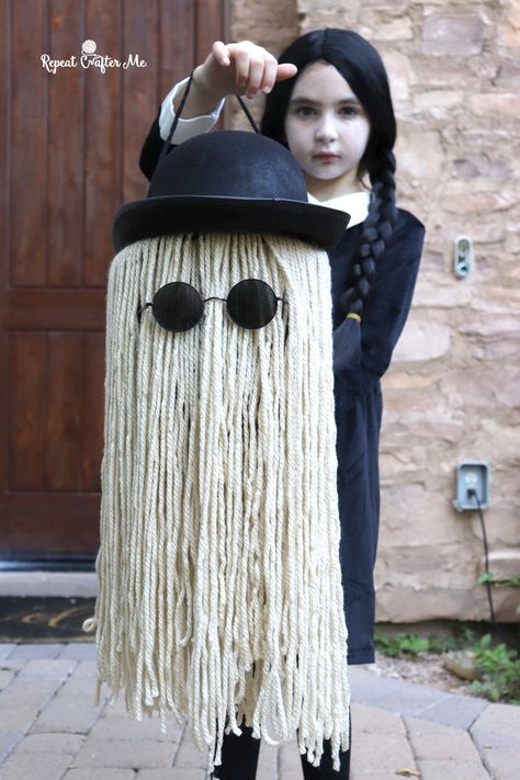 Cousin Itt Halloween Treat Bucket with Bernat Yarn and Addams Family Costume Cousin It Dog Costume, Addams Family Wreath, Cousin Itt Addams Family, Gomez Addams Costume Diy, Diy Thing Addams Family, Cousin It Halloween Bucket, Wednesday Addams Wreath, Original Wednesday Addams, Morticia Costume Diy