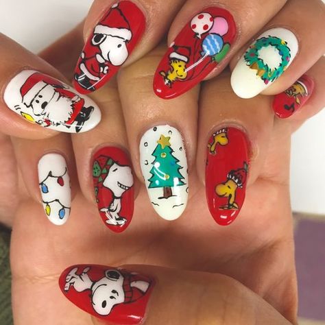 Fun Winter Nails 2023-2024: 19 Playful Ideas - thepinkgoose.com Snoopy Christmas Nail Art, Peanuts Christmas Nails, Christmas Nails Characters, Character Christmas Nails, Christmas Snoopy Nails, 7 Cartoon Characters, Snoopy Nails Christmas, Charlie Brown Christmas Nails, Snoopy Christmas Nails