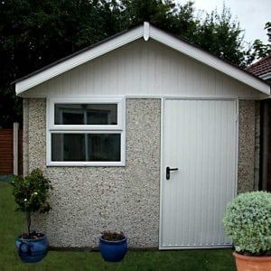 Traditional Concrete Building Concrete Block Shed Ideas, Barn Doors On Concrete Block, Cinder Block Shed Building, Cement Block Storage Shed, Concrete Shed, Concrete Sheds, Pvc Cladding, Barn Style Shed, Concrete Garages