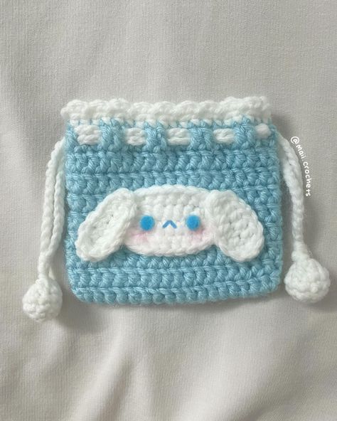 ૮꒰ ˶• ༝ •˶꒱ა ♡ my cinnamoroll pouch test for @kwochet.studio 🩵Here’s my test for the lovely @kwochet.studio’s cinnamoroll mini drawstring bag! Making this pouch is an absolute must! ( I made it for my sister to store her little trinkets😋) It is so cute and easy to make so go check it out now!!!!!😸 /)/) ( . .) ( づ♡ ᯓ ᡣ𐭩 pattern by: @kwochet.studio ˚₊· ͟͟͞➳❥ #crochet #crochetlove #crochetersofinstagram #crocheter #crochetbunny #crochetinspiration #crocheting #crochetplushie #crochetamig... Cute Crochet Drawstring Bag, Cinnamoroll Crochet Pattern Free, Mini Crochet Pouch, Cute Crochet Bag Ideas, Crochet Pouch Ideas, Cinnamoroll Crochet Pattern, Cinnamon Roll Crochet, How To Crochet A Bag, Cute Crochet Pouch