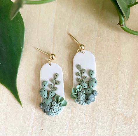 beautiful clay earrings with tiny cactus details Detailed Clay Earrings, Nature Polymer Clay Earrings, Beautiful Polymer Clay Earrings, Polymer Clay Cactus Earrings, Polymer Clay Plant Earrings, Fimo Clay Jewelry, Clay Plant Earrings, Clay Earrings Diy Ideas, Cactus Clay