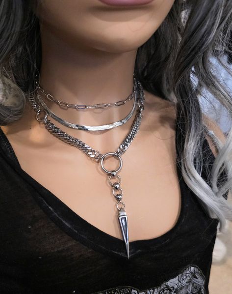 Handmade Chunky Layered Necklace Set, a stunning piece of alternative punk fashion that will elevate any outfit with its bold and edgy look. This necklace features  3 strands of chain styles and an oversized spike or Coffin nail pendant. It is two separate necklaces that can be worn together or on their own. It runs from approximately 15 inches to 18 inches. it is all stainless steel so it is completely waterproof and will NEVER tarnish. The layered design of this necklace set makes it a versati Goth Necklaces Layered, Bold Chain Necklace, Collares Dark, Alt Dark Academia, Alt Necklace, Goth Collar, Alt Jewelry, Punk Mode, Punk Choker