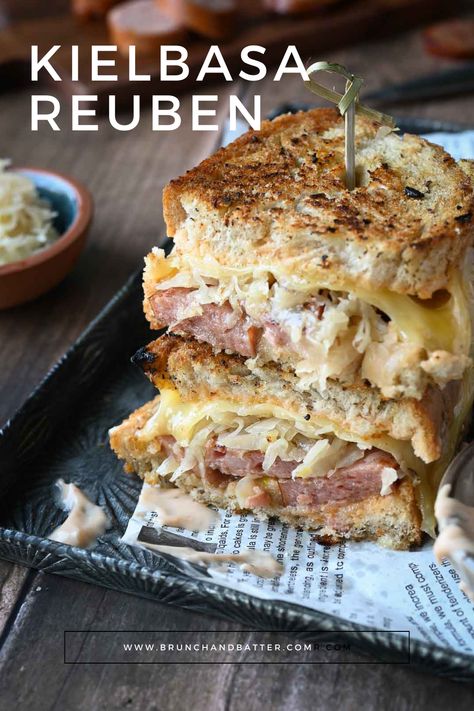 This delicious spin on the classic Reuben sandwich is made with smoky kielbasa sausage for a unique twist. With a homemade thousand island dressing, sauerkraut, and melty Swiss cheese, this is one brunch sandwich you don't want to miss. Kielbasa Sandwich Recipes, Kielbasa Sandwiches, Kielbasa Sandwich, Homemade Thousand Island, Grilled Kielbasa, Classic Reuben Sandwich, Sauerkraut Sandwich, Homemade Thousand Island Dressing, Reuben Sandwich Recipe