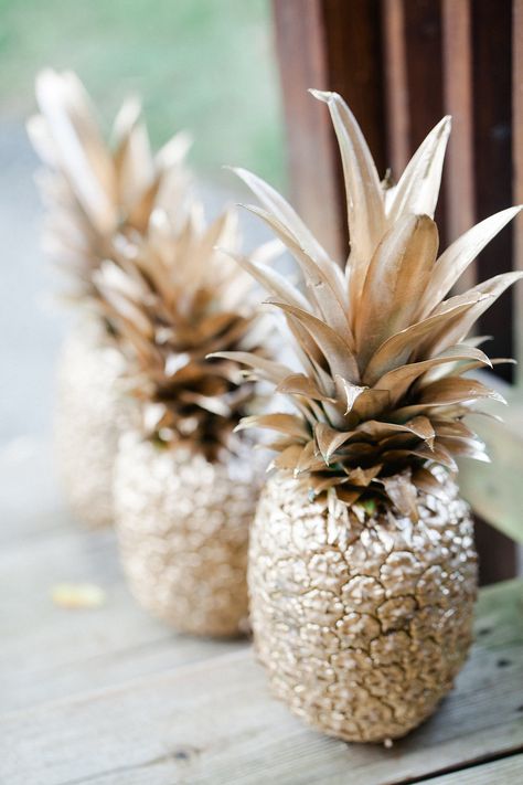 Spray-Painted Pineapples: Spray-painting real pineapples is a cheap and easy DIY, and they are a great addition to the party decor.  Source: KCB Photography Ibiza Party, Snowman Crafts Diy, Pina Coladas, Chic Bridal Showers, Tropical Bridal Showers, Fiesta Tropical, Tropical Bridal, Pineapple Parties, Bollywood Party