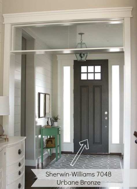 entryway with dark gray door. urbane bronze by Sherwin williams Urbane Bronze, Painted Interior Doors, Interior Paint Colors Schemes, Front Door Paint Colors, Door Paint Colors, Grey Doors, Painted Front Doors, Black Door, Front Door Colors