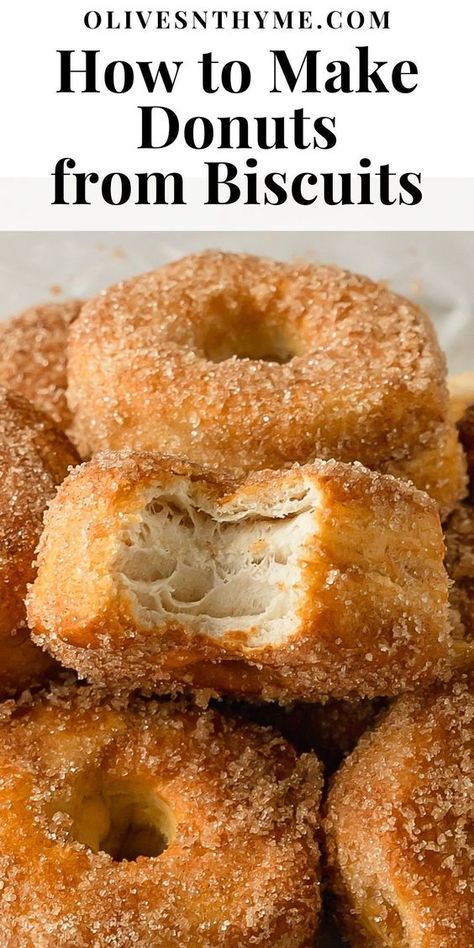 Air fryer biscuit donuts are flaky and fluffy air fryer donuts made using store bought, refrigerated biscuit dough. These easy to make biscuit doughnuts are dipped in melted butter and covered in a sweet and crunchy cinnamon sugar coating. Prep and air fryer these cinnamon sugar biscuit donuts in under 10 minutes. Biscuit Donuts In Air Fryer, Air Fryer Cinnamon Roll Donut Recipes, Airfryer Biscuit Donut, Recipes That Use Biscuit Dough, Homemade Biscuit Donuts Recipe, Air Fryer Cronuts Recipes, Air Fry Biscuit Doughnut, Air Fryer Doughnut Recipes Biscuit, Bisquick Donuts Air Fryer