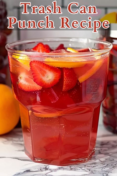 Trash Can Punch is the ultimate party drink, perfect for large gatherings and celebrations. This vibrant punch combines 16 ounces of vodka, 16 ounces of 151 rum (or any other high-proof rum), and a gallon of Hawaiian Punch. It’s an easy-to-make, crowd-pleasing cocktail that packs a flavorful punch. Alcohol Punch Recipes For A Crowd, Vodka Punch Recipes Parties, Vodka Fruit Punch, Hawaiian Punch Recipes, Trash Can Punch, Party Punch Alcohol, Vodka Punch, Alcoholic Punch Recipes, Rum Punch Recipes