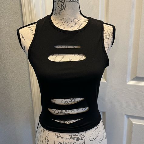 Solid Black Ripped Crop Tank Top. Size Small. New In Package Measures Approximately (Laying Flat) Armpit To Armpit 16 Length 18 Ripped Shirt Design, Punk Tops Women, Distressed Tank Top Diy, How To Cut A Shirt Into A Tank Top, Ripped Clothes Aesthetic, How To Make A Tank Top, Cut Tshirt Ideas, Ways To Cut T Shirts, Cut Shirt Designs Diy