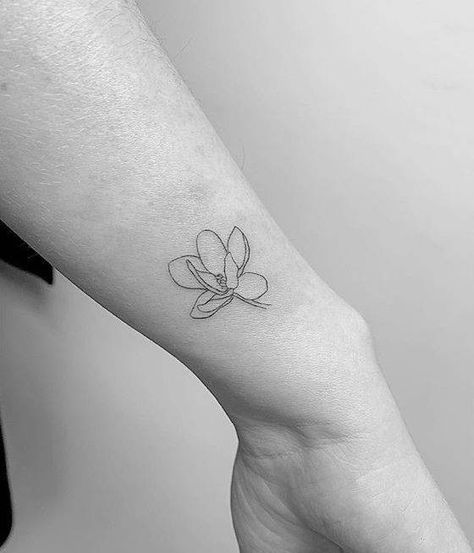 Magnolia tattoo on the wrist. Magnolia Flower Tattoo, Magnolia Tattoo, One Line Tattoo, Orchid Tattoo, Petite Tattoos, Line Art Tattoos, Dainty Tattoos, Feminine Tattoos, Mom Tattoos