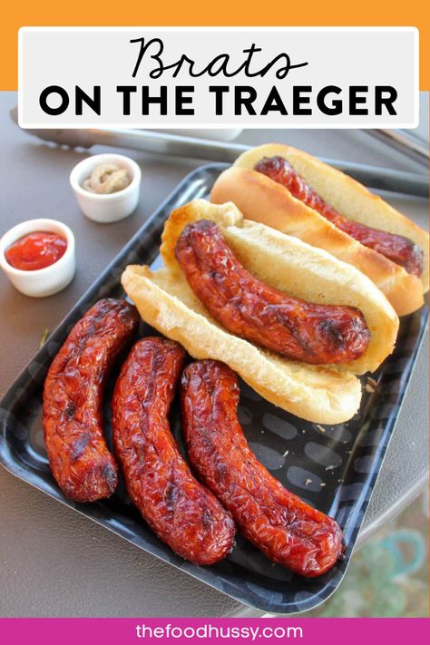 Making Brats on the Traeger is a delicious cookout lunch anytime! Cooking them a little more slowly than on the grill turns them a beautiful dark color and infuses your brats with a smoky amazing flavor! via @foodhussy Bacon On Traeger Grill, Brats On Smoker, Brats On The Blackstone, Brats On The Traeger, Brats On Pellet Grill, Smoked Brats Pellet Grill, Pineapple Brat, Smoked Brats, Mexican Macaroni Salad