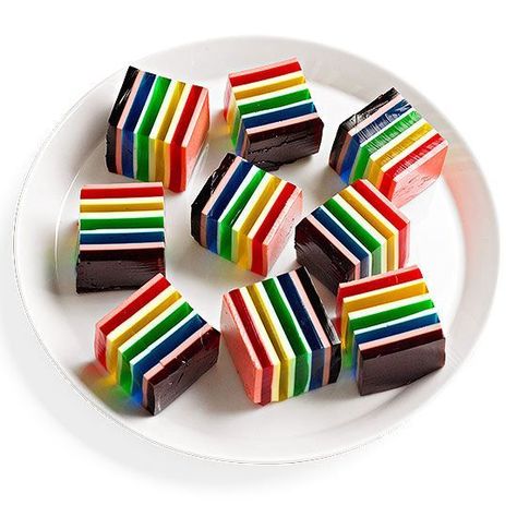 Make this gelatin recipe that is classic and delicious. This recipe is great for entertaining for any occasion and a perfect potluck dish. Even the kids will love this colorful dessert recipe. Ribbon Jello, Rainbow Foods, Rainbow Jello, Throwback Party, Gelatin Recipes, Jello Desserts, Party Spread, Jello Mold, Jello Molds